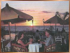 Couple dining at sunset.